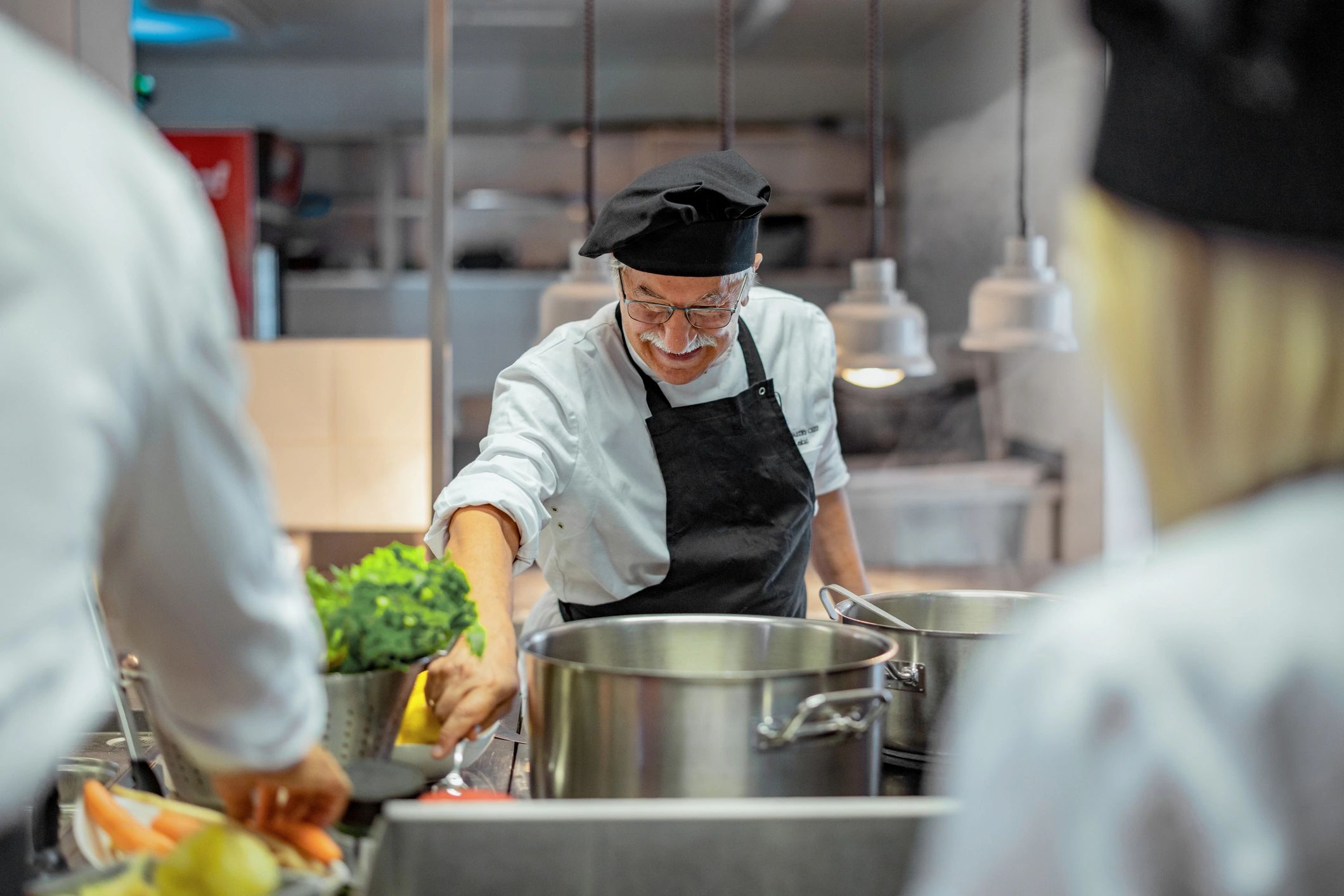 Chef preparing food in a professional kitchen
