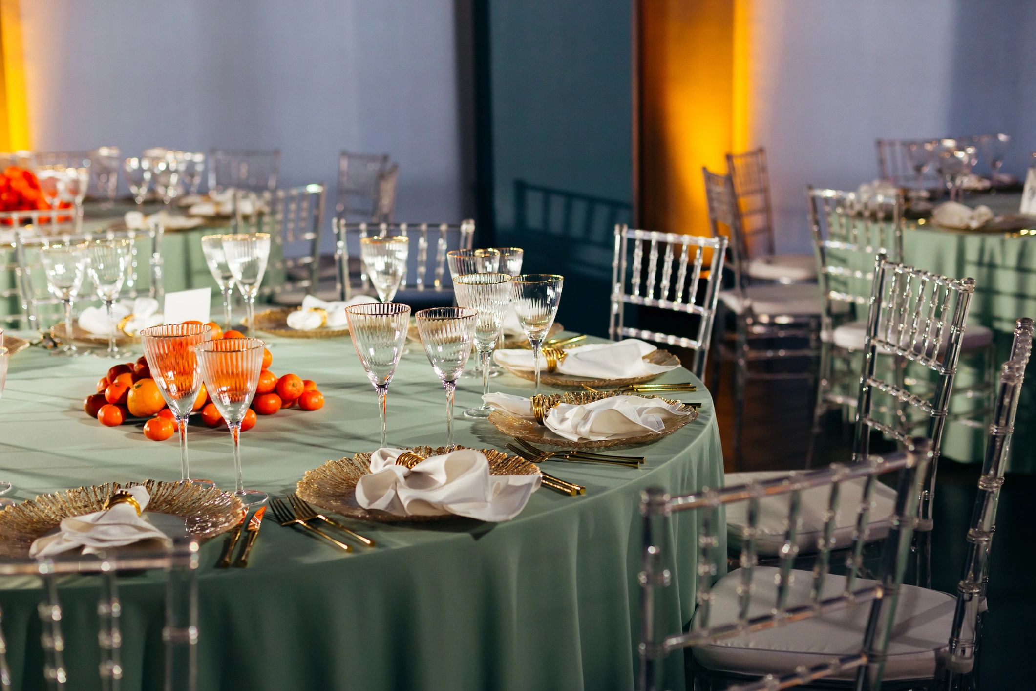 Event tables set for a celebration with snacks and decor